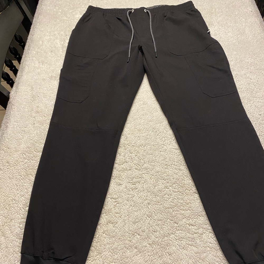 Beyond scrubs joggers. Color is black. Size medium tall.